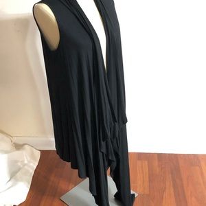 Long black sleeveless cardigan vest. Size L